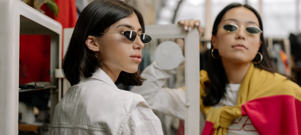 two women wearing fashion sunglasses