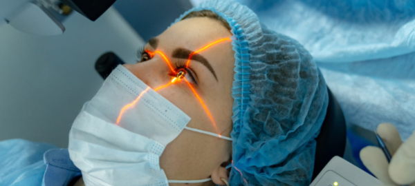 woman undergoing laser eye surgery