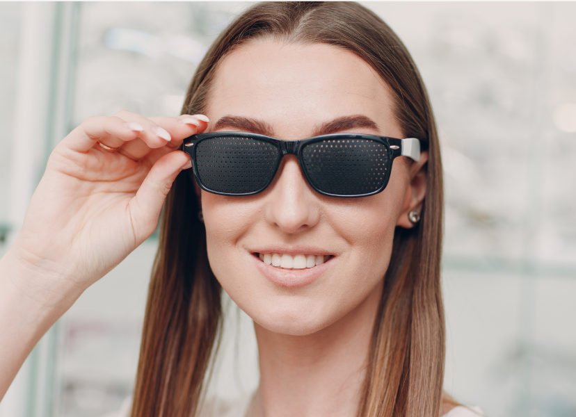 woman wearing pinhole glasses