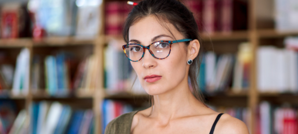 woman wearing librarian glasses