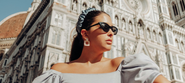 woman wearing cat eye sunglasses